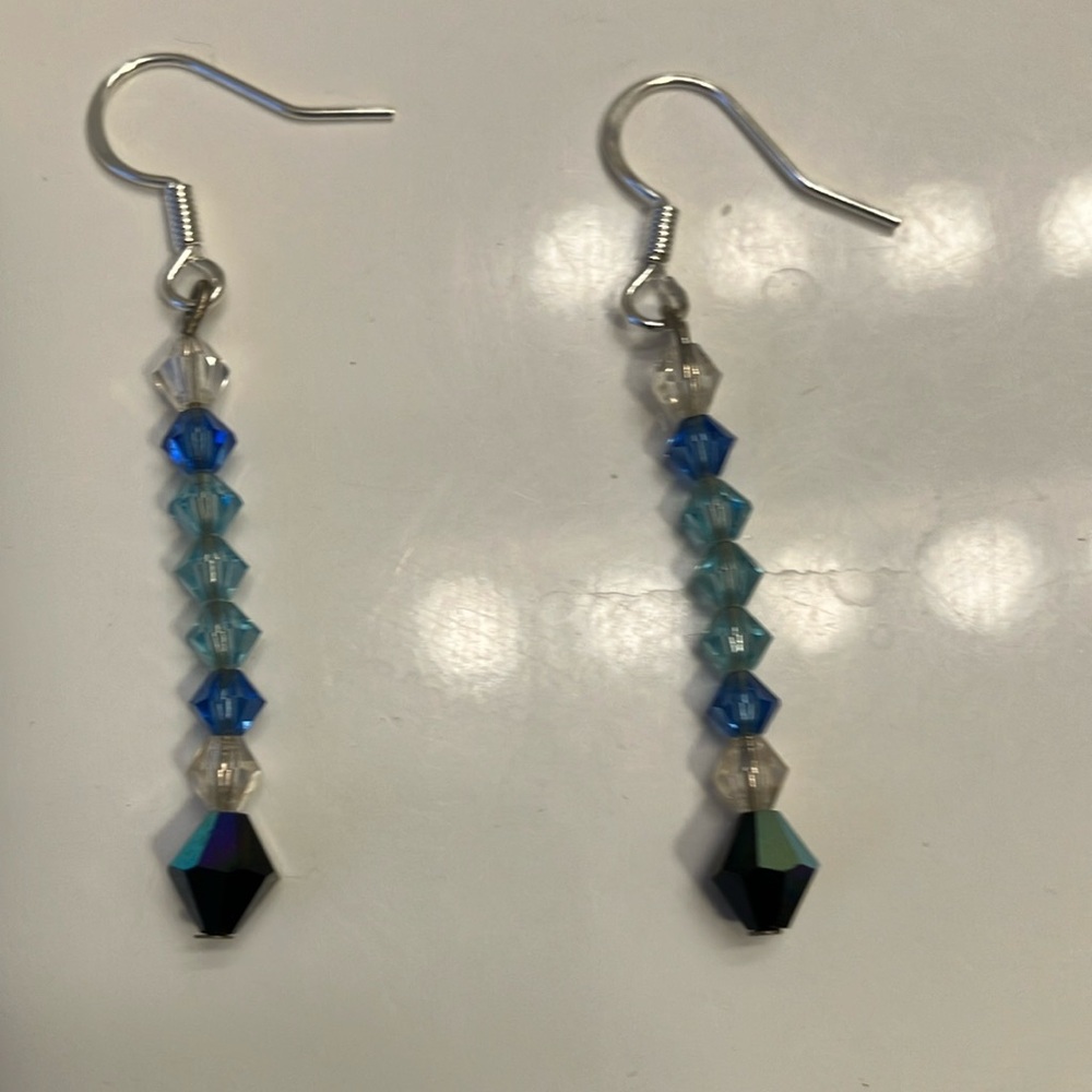 Blue and clear iridescent crystal beads earrings.
